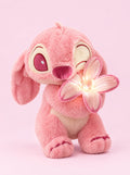Pink Bloom plush holding its glowing flower